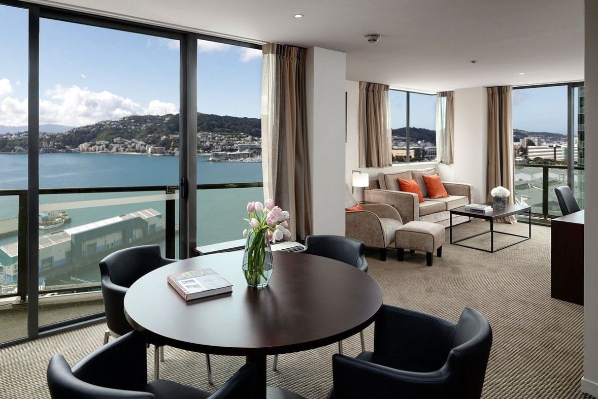 Premium room with schist feature wall and lake view